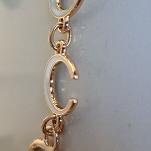 Coach Monogram Wt &Gold Purse Charm or Strap Extender. Only For The C Chain.NWOT